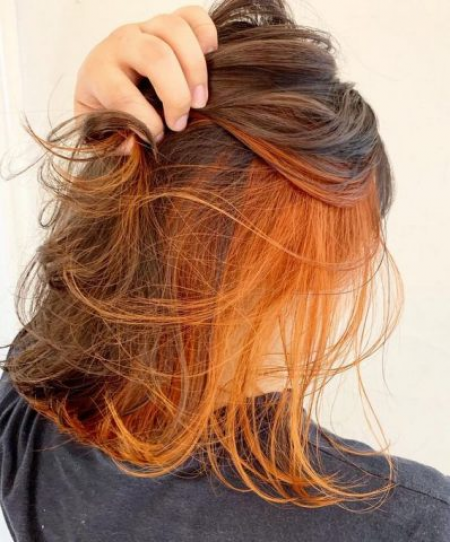 Nhuộm tóc giấu màu cam